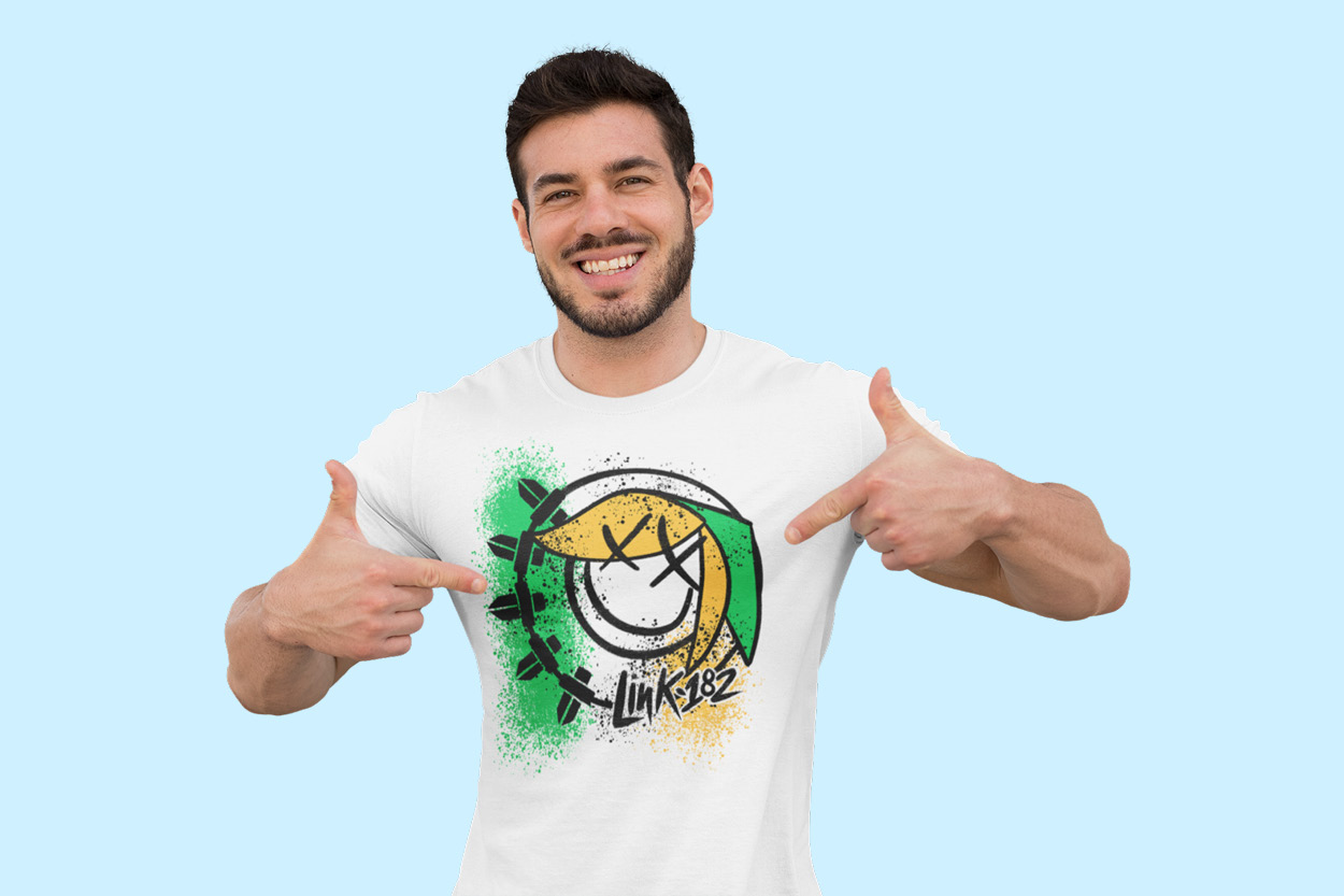Man pointing at his t-shirt design